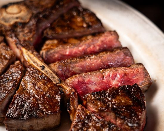Appetizer & USDA PRIME T bone Steak course + a glass of Champagne 