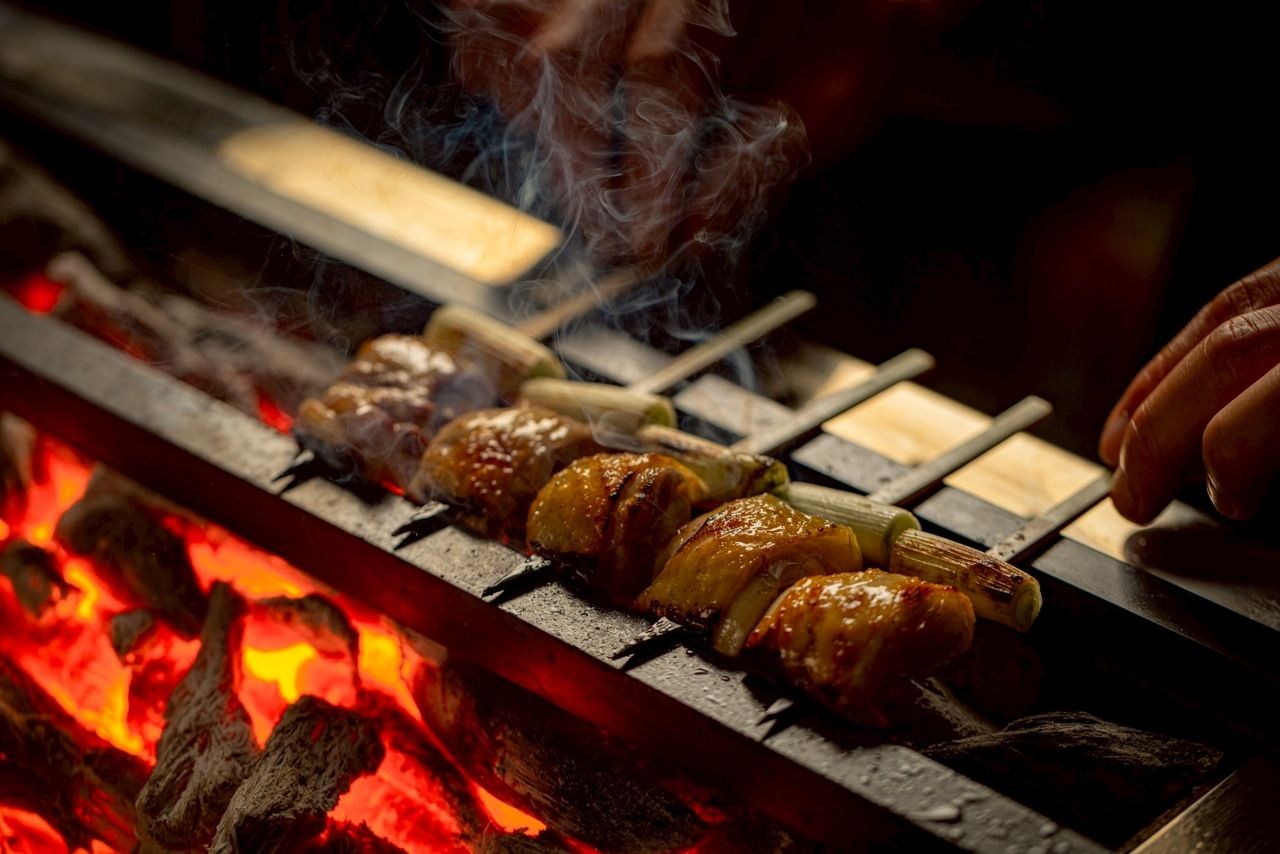 Grilled skewers and cooked rice course