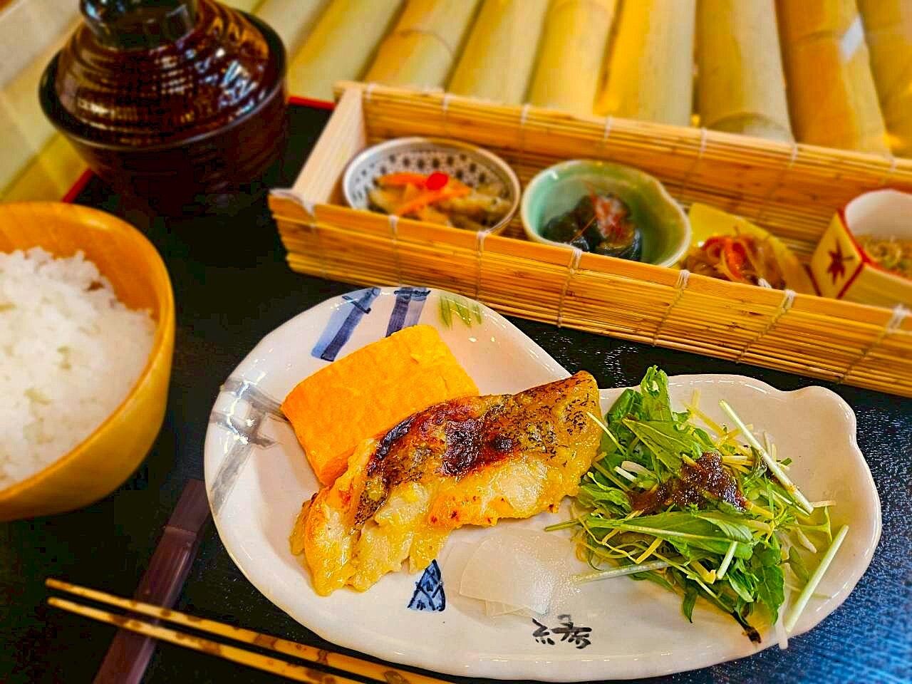 Silver flounder Saikyo-yaki set meal (includes rolled egg made with dragon eggs, side dishes, salad, and red miso soup)