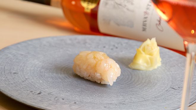 Chef's choice course + wine pairing (half portion)