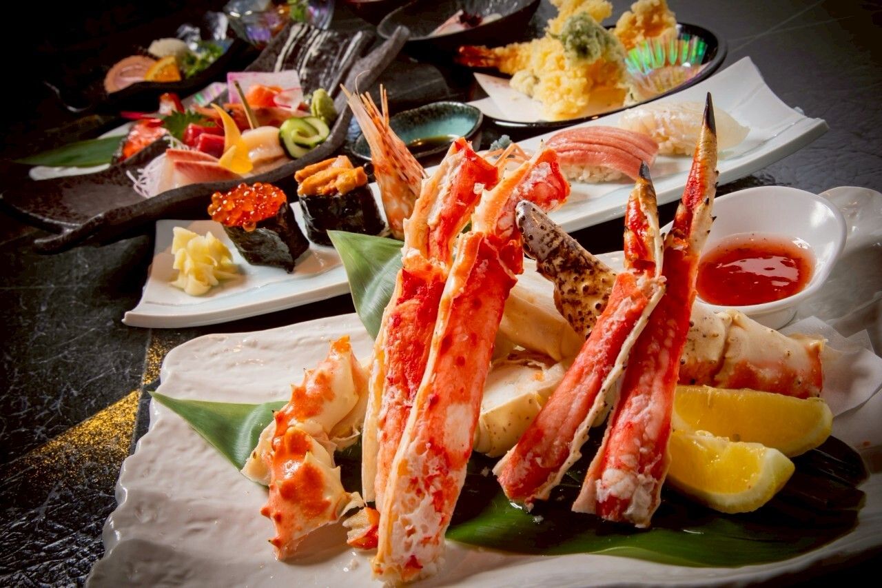 A satisfying plan that includes seasonal sashimi, sushi, and even king crab